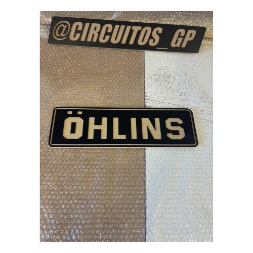 Logo Öhlins en madera
